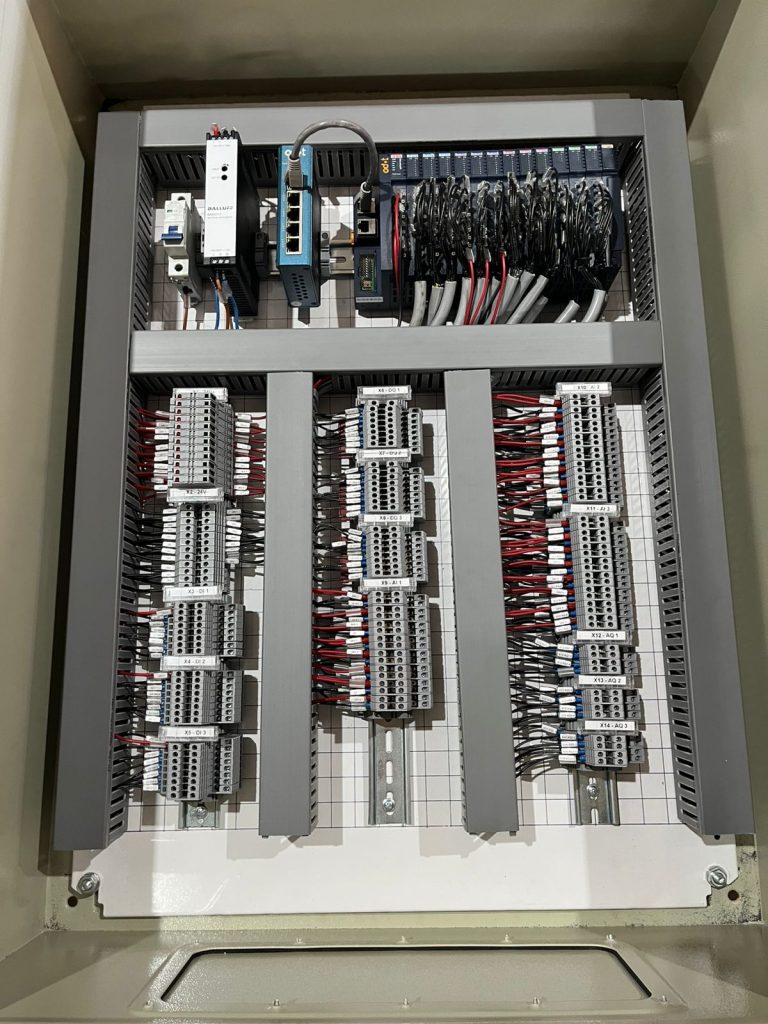 Industrial automation control panel with PLC components and electrical wiring installed by Proplant PCE.