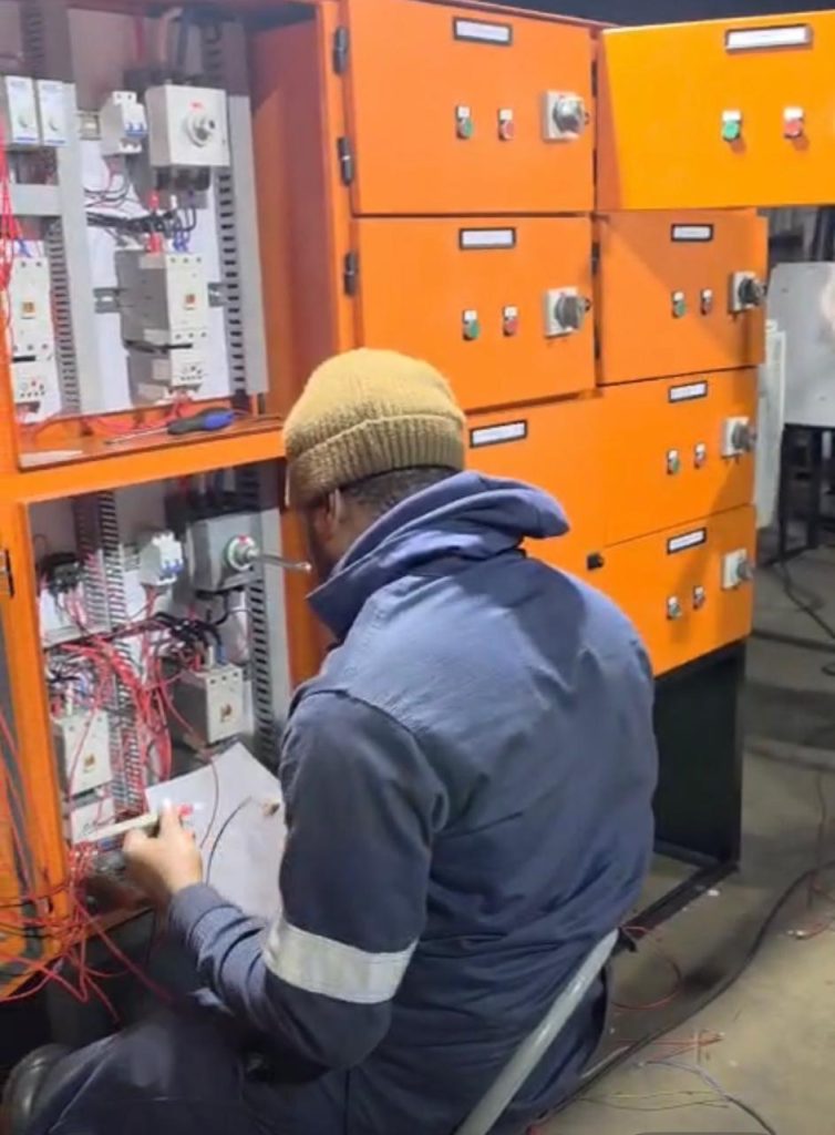 Proplant PCE engineer commissioning industrial electrical control panels and automation systems.